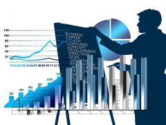 Bild zeigt ein Mänchen vor einem Flipchart, imHintergrund Statistikbalken