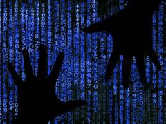 Bild mit zwei Händen die versuchen Daten zu stehlen